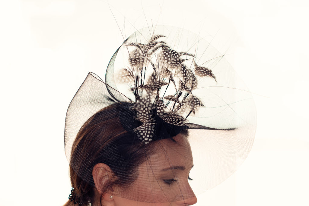 Black crin headpiece with guinea fowl feathers