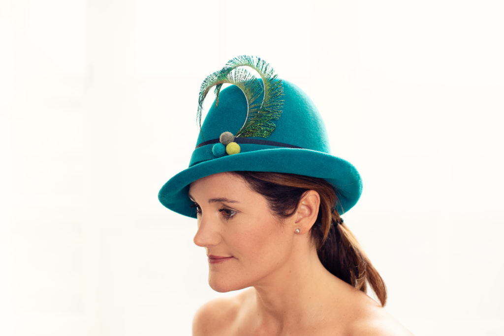 teal felt hat with pheasant feathers